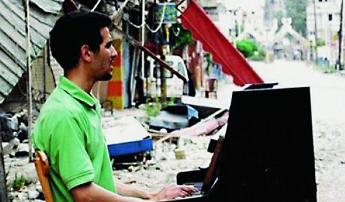 Ayham Ahmad, “il leggendario pianista di Yarmouk”